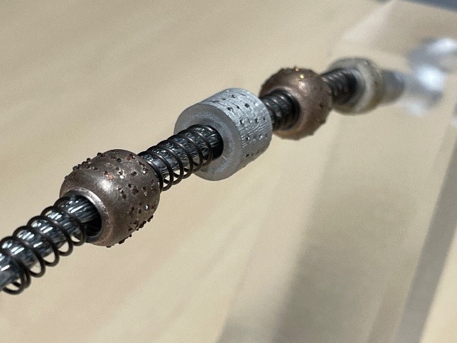 Gedruckte Schleifwerkzeuge Metall + Diamant mittels Additivem Siebdruck.